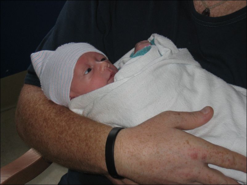 Owen held by Max